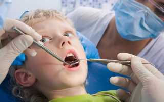 Что делать, если у ребенка на зубах появился черный налет?